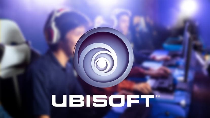 Ubisoft logo and wordmark centered over blurred gamers in a blue-lit esports venue with professional headsets.