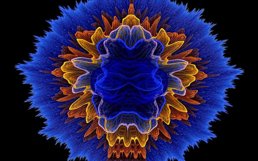 Fractal flower with a sapphire core and amber petals ending in sharp electric blue sparks on a dark base.