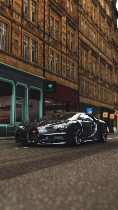 Sleek Black Bugatti Chiron on Cobblestone Street