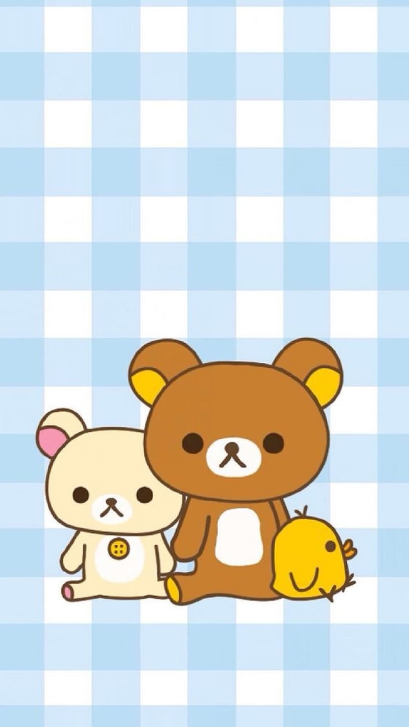 Rilakkuma, Korilakkuma, and Kiiroitori sit side-by-side on a crisp blue and white gingham checkered background.
