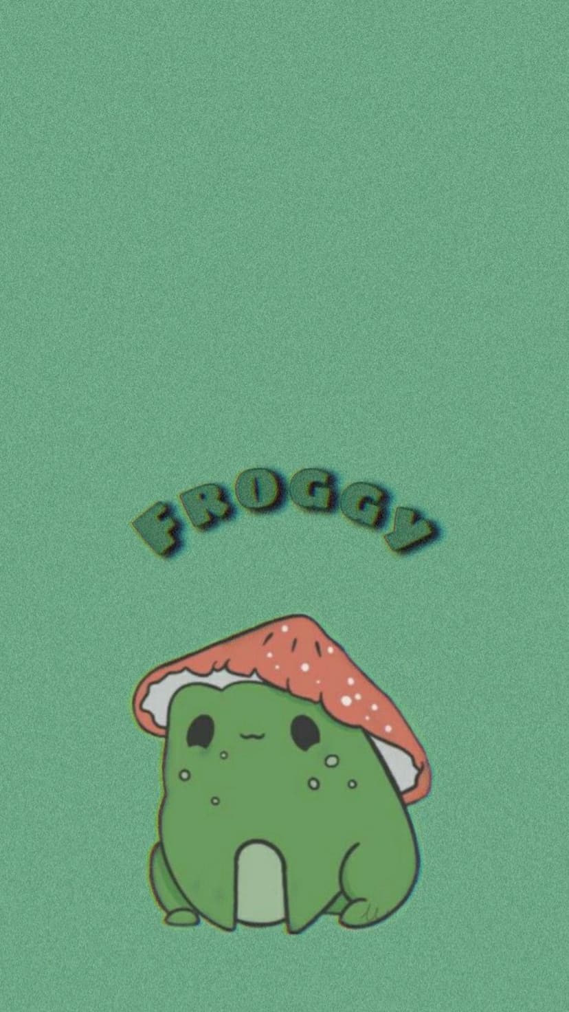 Green frog wearing a red mushroom cap with the word Froggy written in a playful font on a soft background.