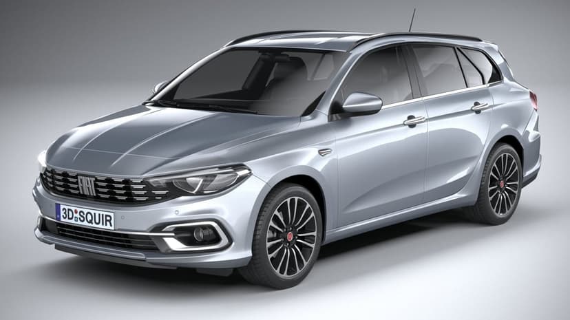 Silver Fiat estate car with multi-spoke wheels in a minimalist grey studio with soft lighting.