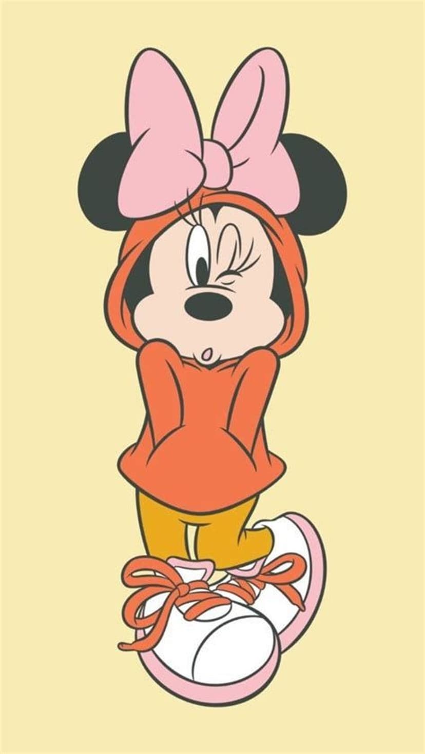 Minnie Mouse winking while wearing a bright orange hoodie and pink bow against a solid light yellow background.