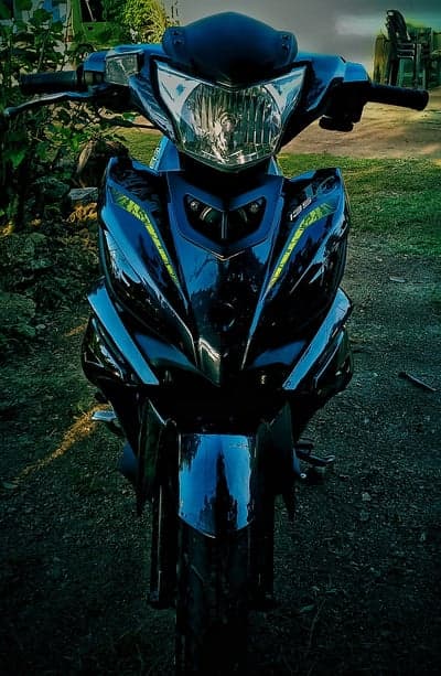 Black Motorcycle Front View with Green Accents