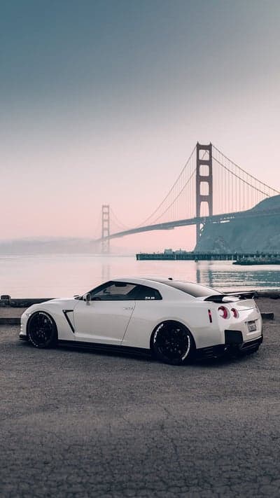 White GT-R Sports Car Golden Gate Mobile Background