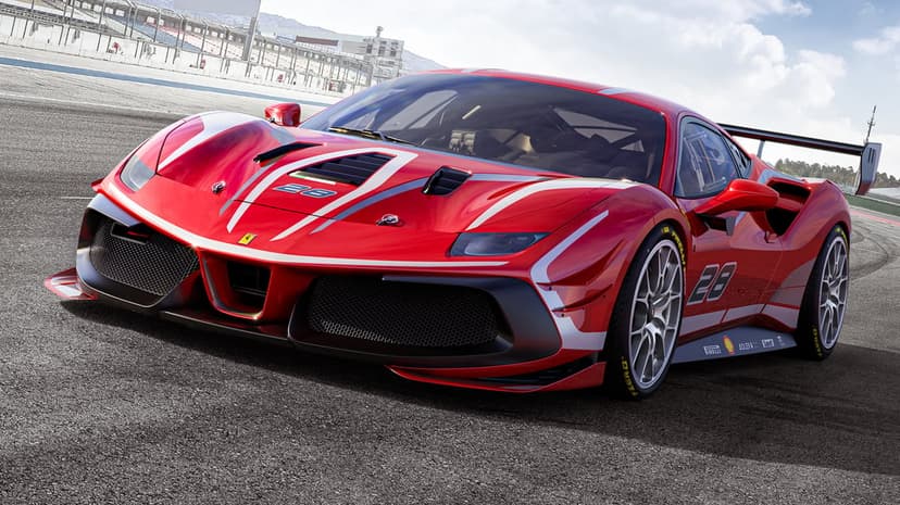 Red Ferrari 488 Challenge Evo race car with silver accents on an asphalt racetrack under a sunny sky.