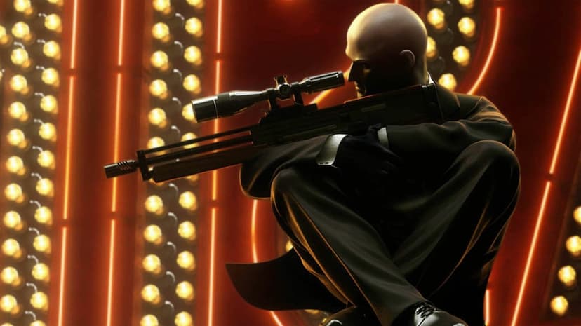Profile of a bald man in a black suit holding a sniper rifle against a backdrop of glowing orange circular lights.