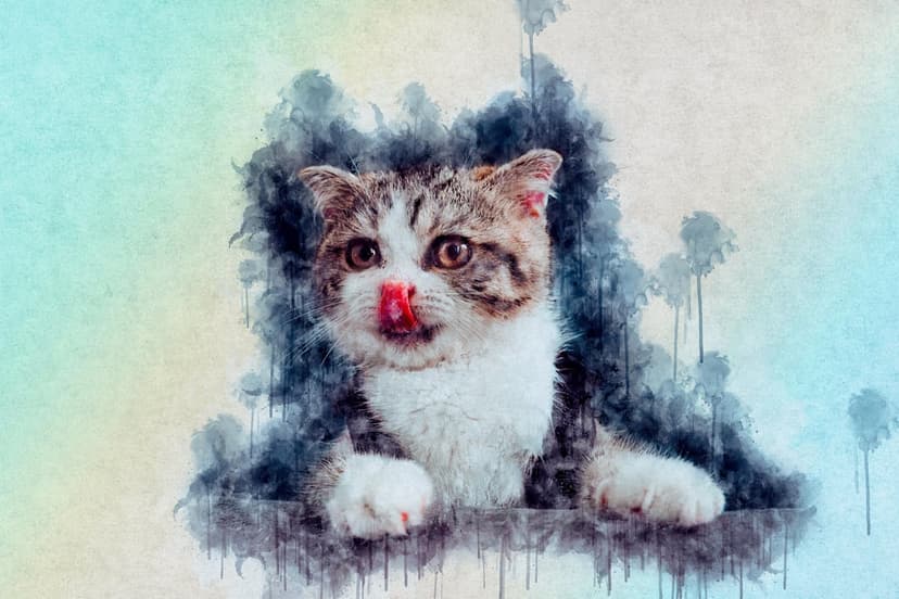Tabby and white kitten with its tiny pink tongue sticking out against a soft pastel and textured background.