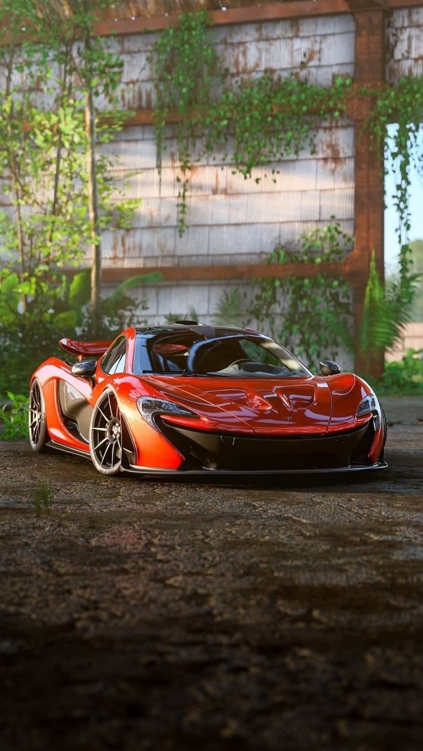 Crimson McLaren P1 parked near rustic timber beams in a sun-dappled forest with lush green foliage.
