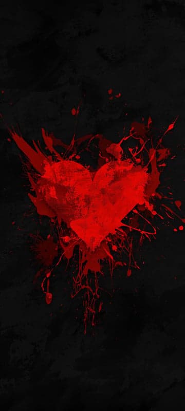 Red Splattered Heart on Grunge Black Background