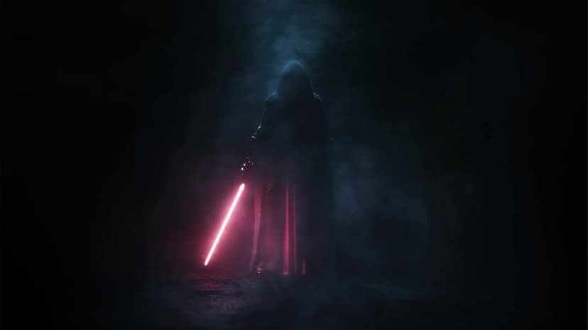 Hooded figure holding a glowing red lightsaber in a dark misty room with dramatic top-down blue lighting.