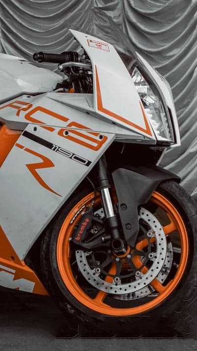 KTM RC 125 Motorcycle Front View Orange and White