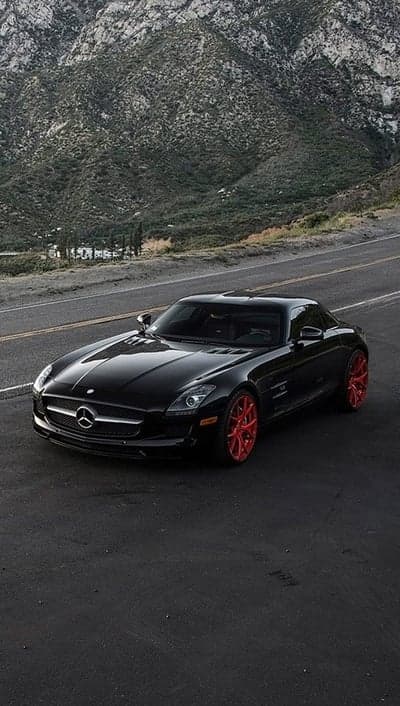 Black Mercedes SLS AMG with Red Rims on Scenic Road
