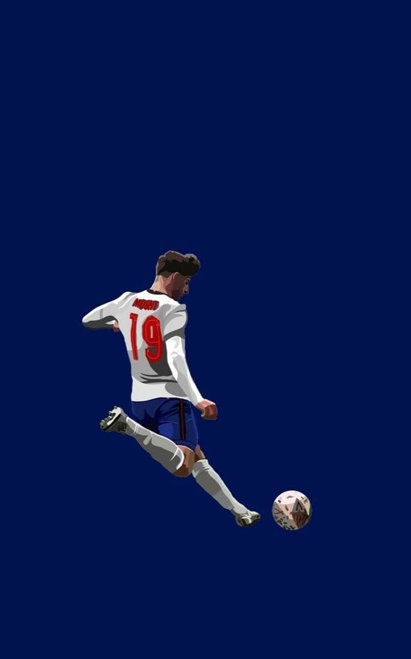 Mason Mount in a white jersey kicks a soccer ball against a solid navy blue background in a dynamic sports pose.