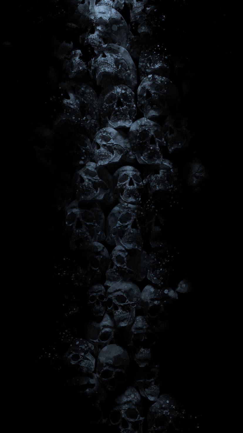 Weathered human skulls stacked in a vertical pile with deep shadows and negative space on a black background.