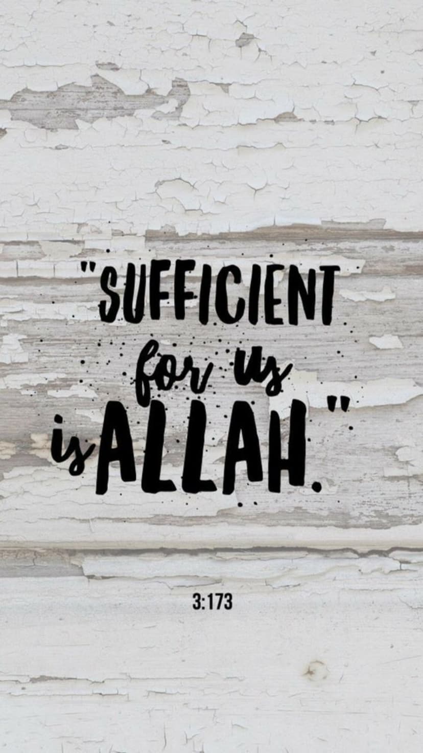 Sufficient for us is Allah quote in dark splattered text over aged white wooden planks with peeling paint.