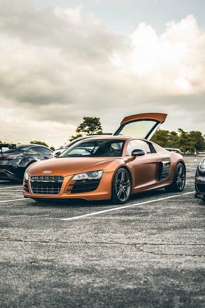 Orange Audi R8 Convertible with Doors Open