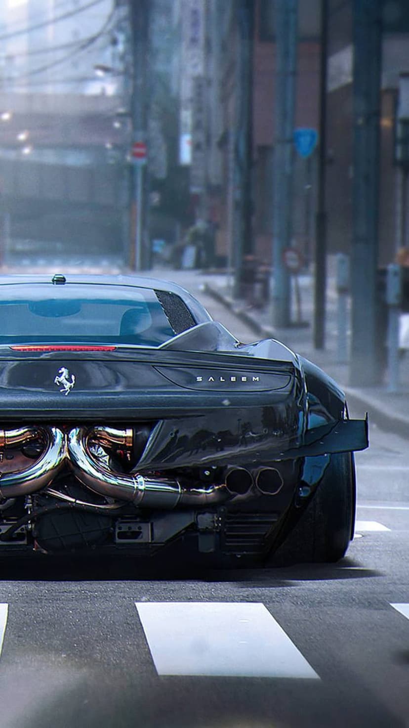 Black Saleen S7 Twin Turbo supercar showing its rear quarter and exhaust pipes on a blurred urban city street.