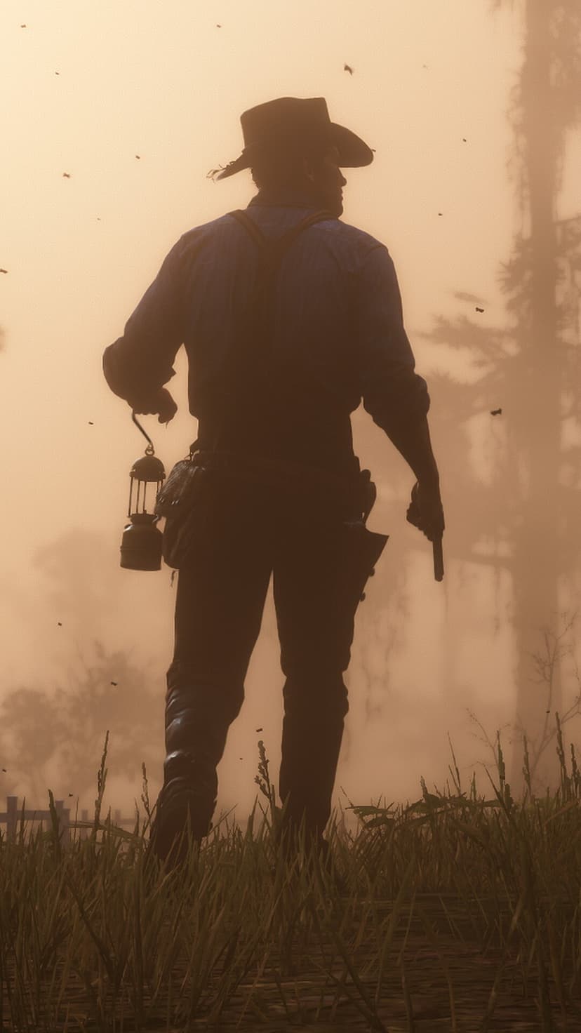 Silhouette of a cowboy holding a lantern and gun walking through tall grass in golden mist and hazy sunlight.