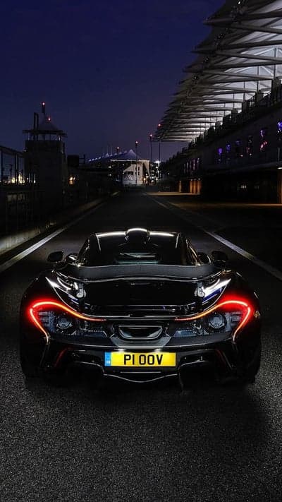 Dark McLaren P1 Hypercar Night Race Track Phone Background