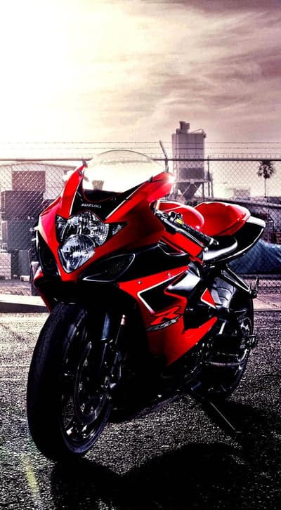 Red Suzuki GSXR Sportbike Urban Vertical Wallpaper