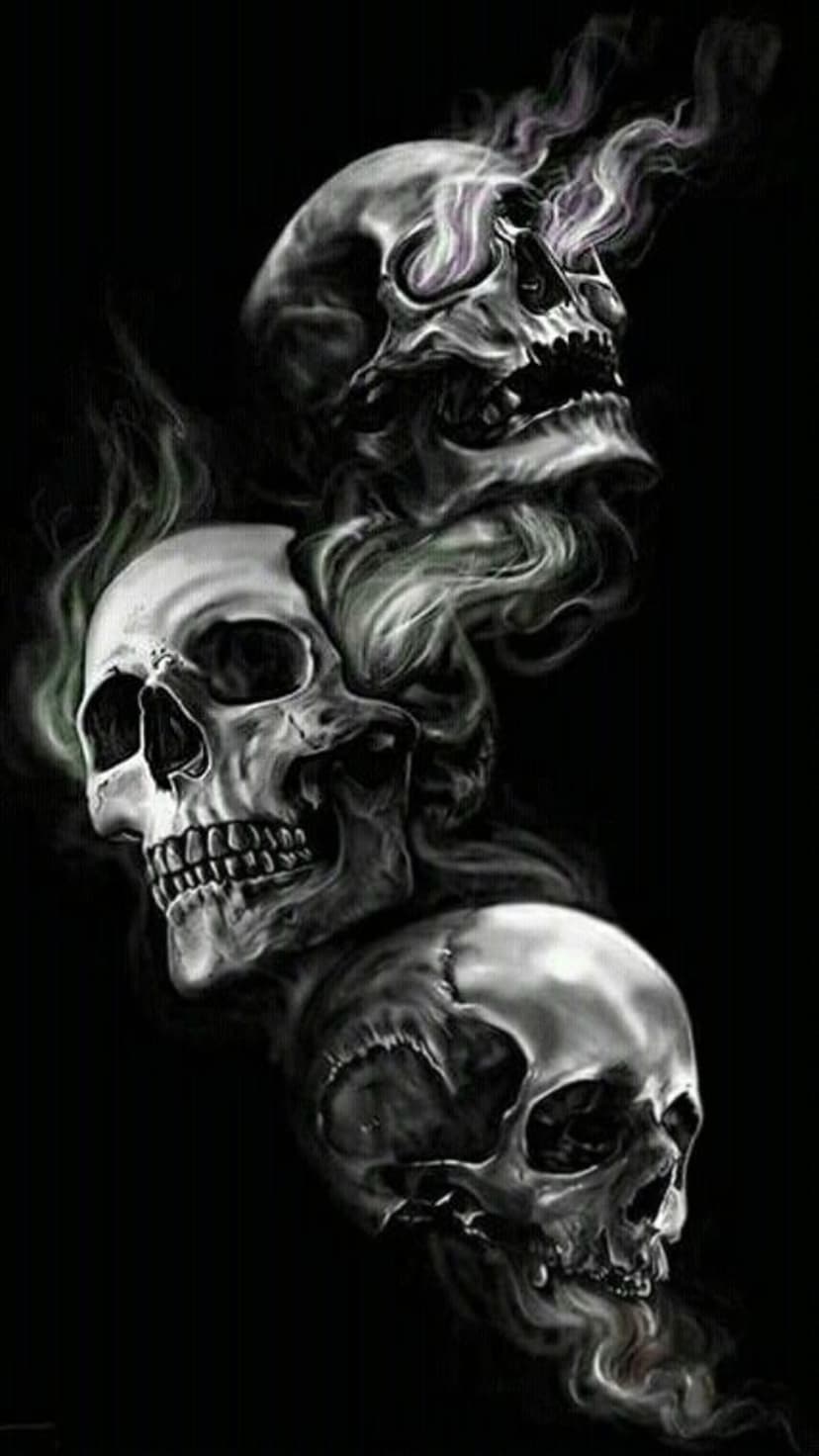 Three human skulls stacked vertically emerge from swirling gray smoke against a solid black background.