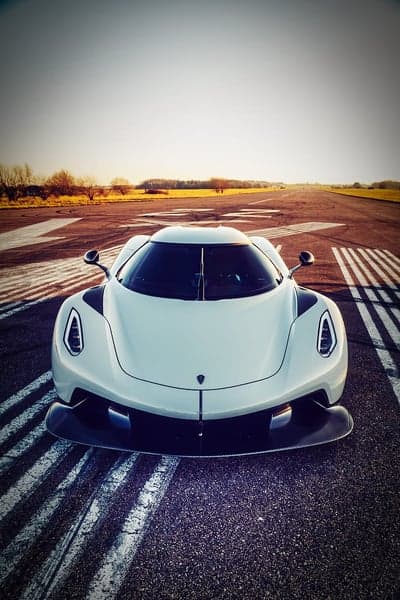White Koenigsegg Jesko on a Racetrack at Sunset