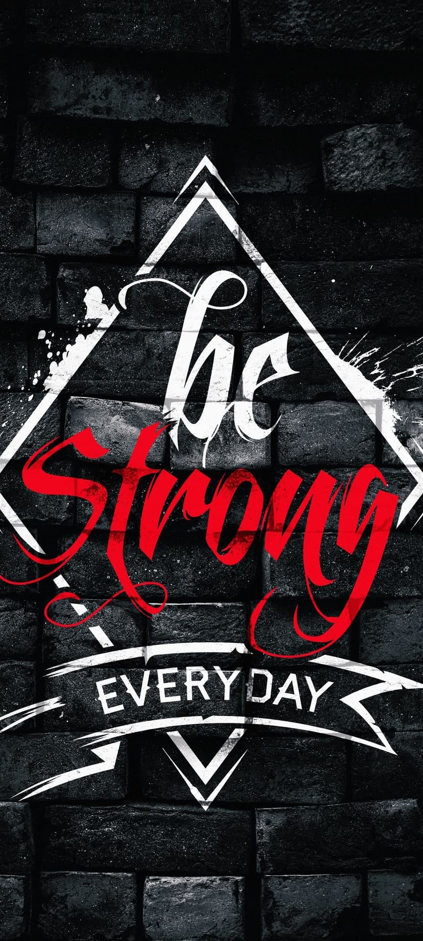 Be Strong Every Day text in red and white font layered over a dark, textured charcoal brick wall background.
