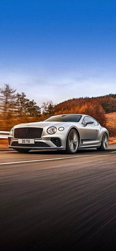Bentley Continental GT Speeding Down Scenic Road