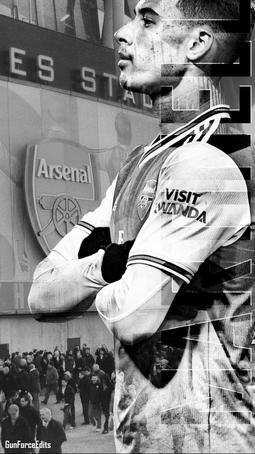 Bukayo Saka in a monochromatic Arsenal kit with glitch effects and a blurred stadium crowd background.