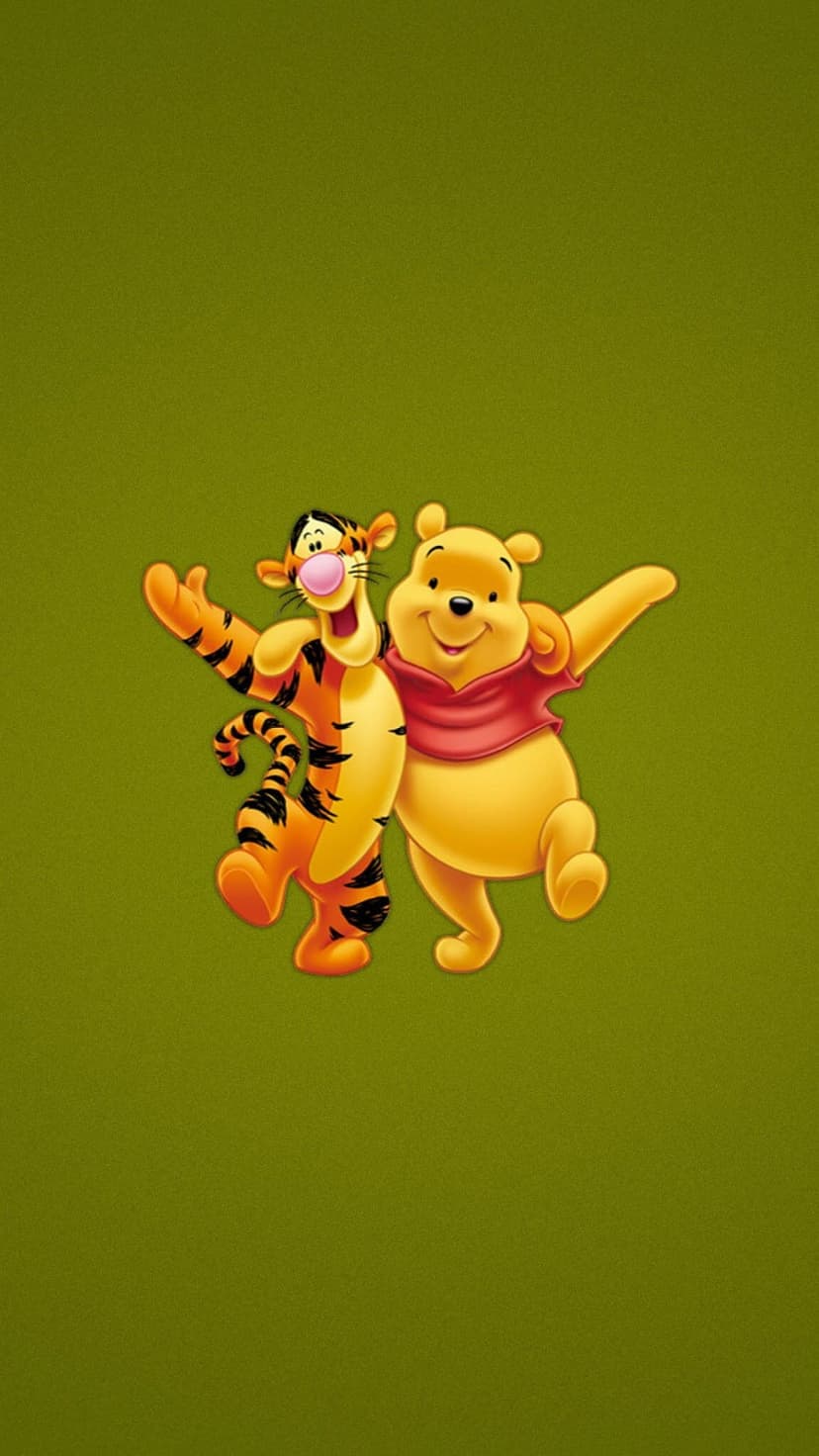 Winnie the Pooh and Tigger stand together smiling against a textured olive green background in a vertical layout.