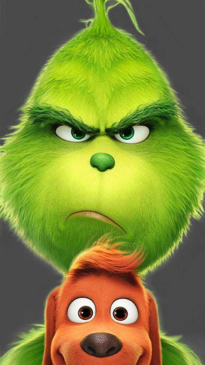 The Grinch with a furrowed brow stands next to Max the dog who has large expressive eyes and a happy face.