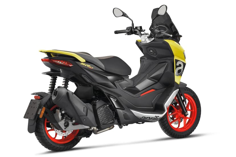 Rear view of a yellow and black Aprilia SR GT 200 scooter with bright red wheels against a white background.