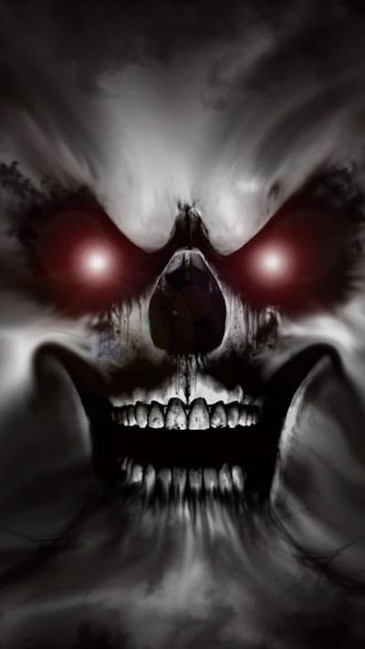 Scary Skull with Red Eyes and Smoky Wisps