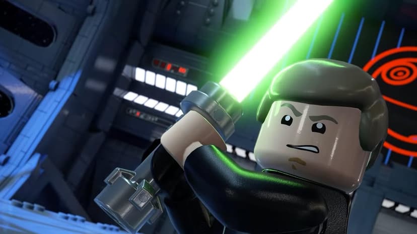 LEGO Luke Skywalker minifigure holds a glowing green lightsaber inside a dark Imperial spaceship corridor.