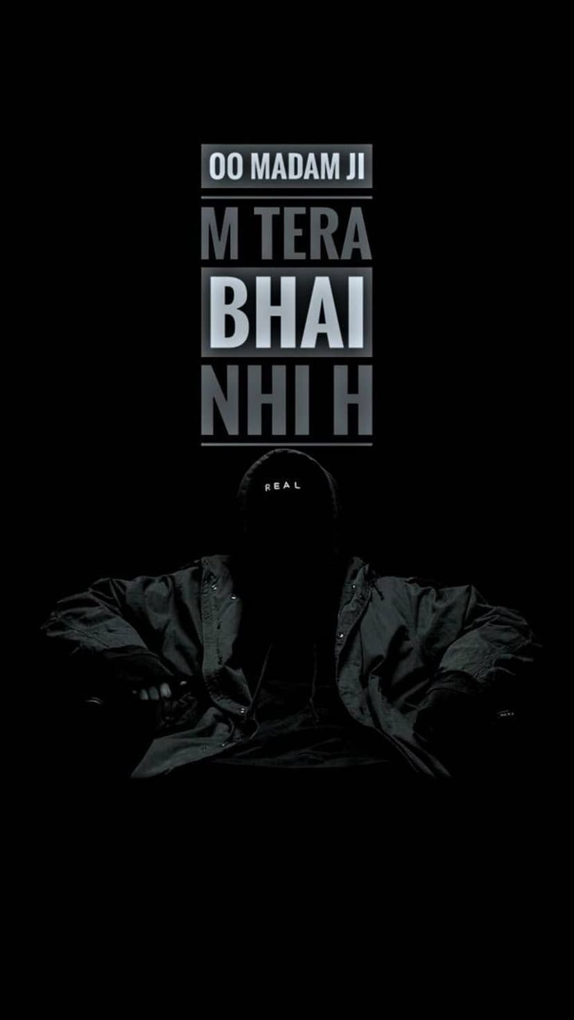 Silhouetted person wearing a REAL cap sits in darkness below bold white Hindi text on a black background.