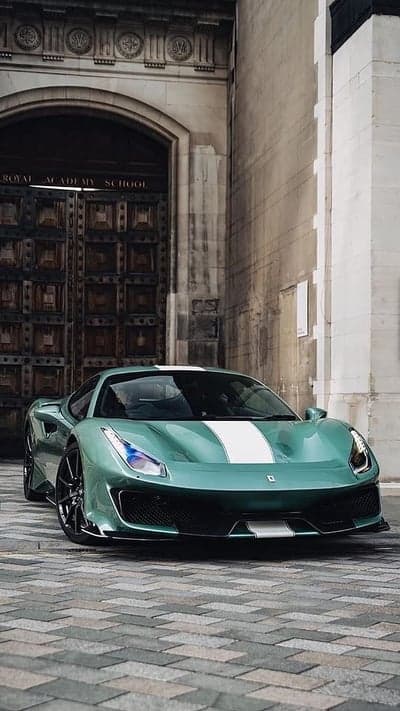 Green Ferrari parked in front of Royal Academy School