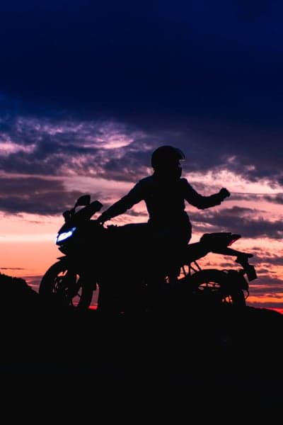 Biker Silhouette at Twilight Sunset Mobile Background