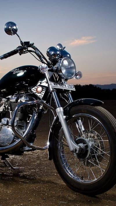 Classic Royal Enfield motorcycle at sunset