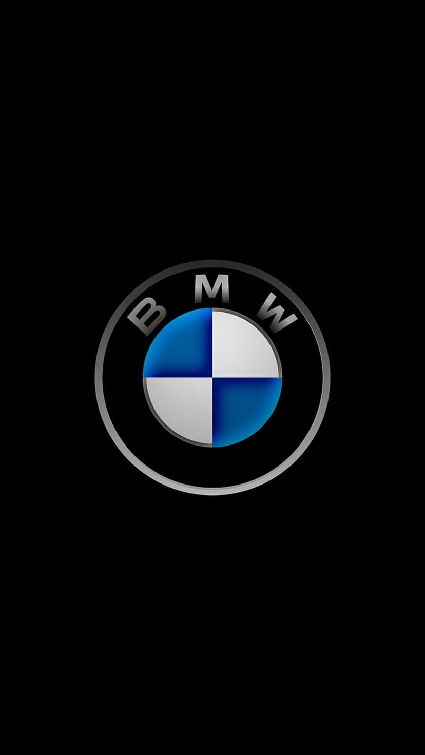 BMW logo with blue and white quadrants and a silver metallic ring centered on a solid black background.
