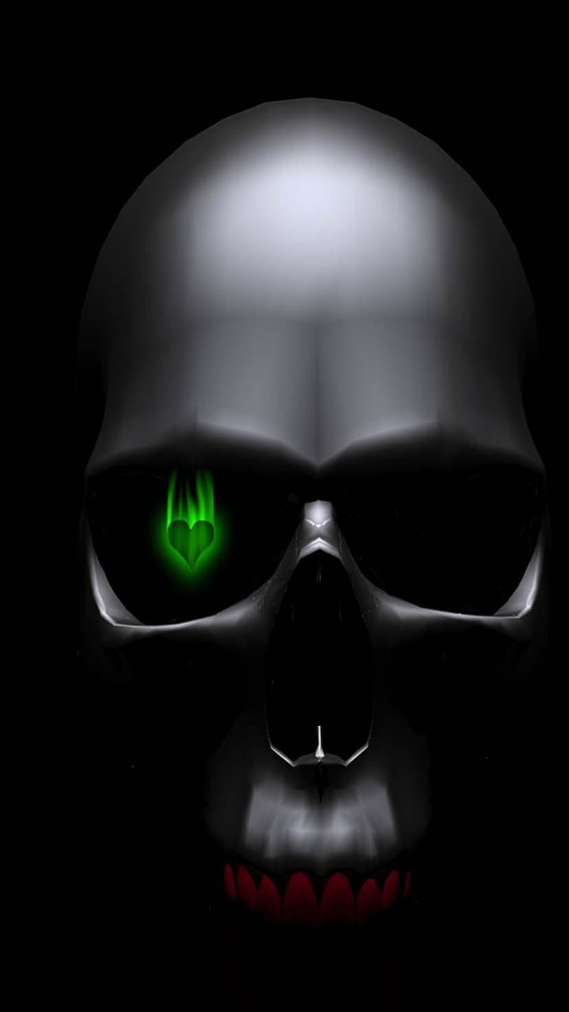 Metallic skull with a green heart-shaped flame in the eye socket and red accents against a dark background.