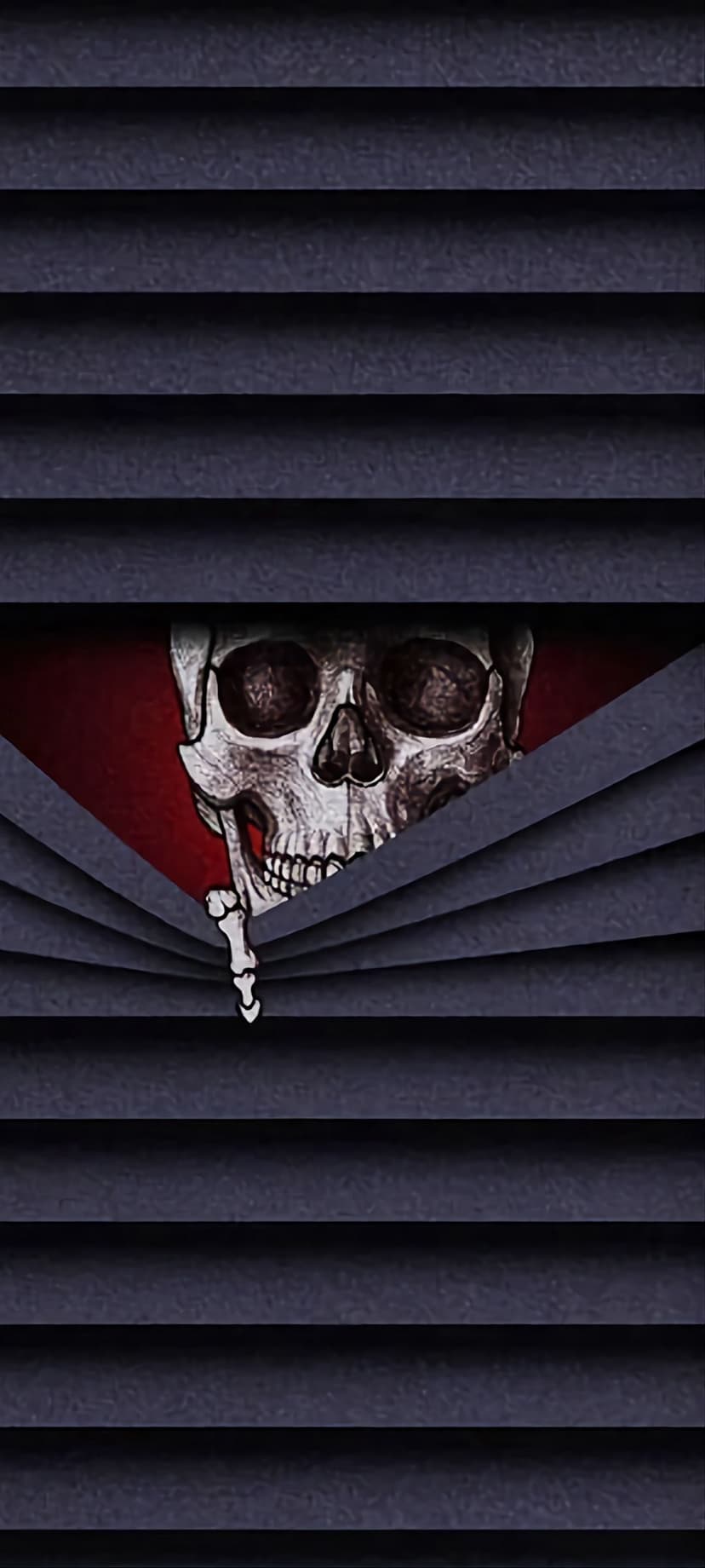 Human skull with hollow eyes peeking through horizontal window blinds against a deep crimson background.