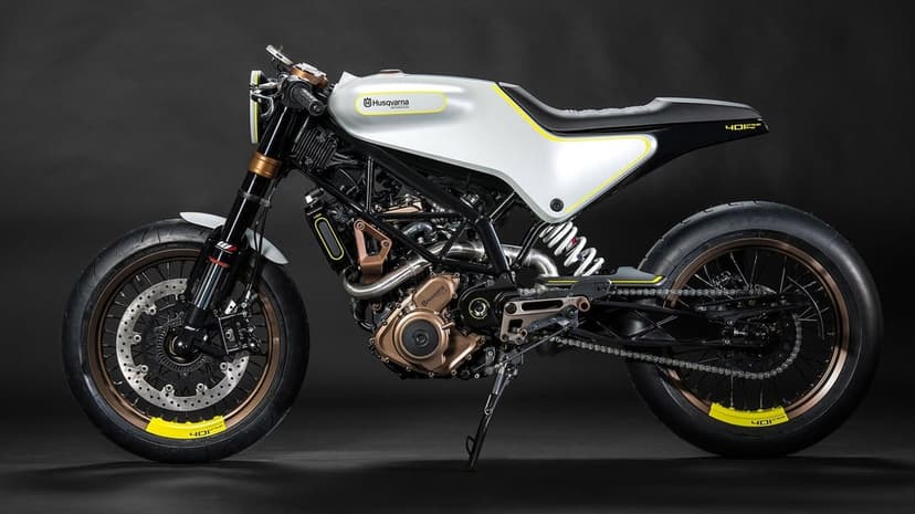 Profile of a white and bronze Husqvarna Vitpilen 401 motorcycle with yellow accents on a black background.