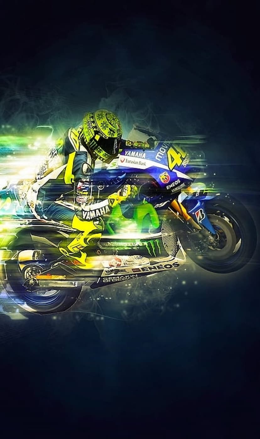 Valentino Rossi in yellow leathers racing a Yamaha motorcycle with vibrant motion blur light streaks and smoke.