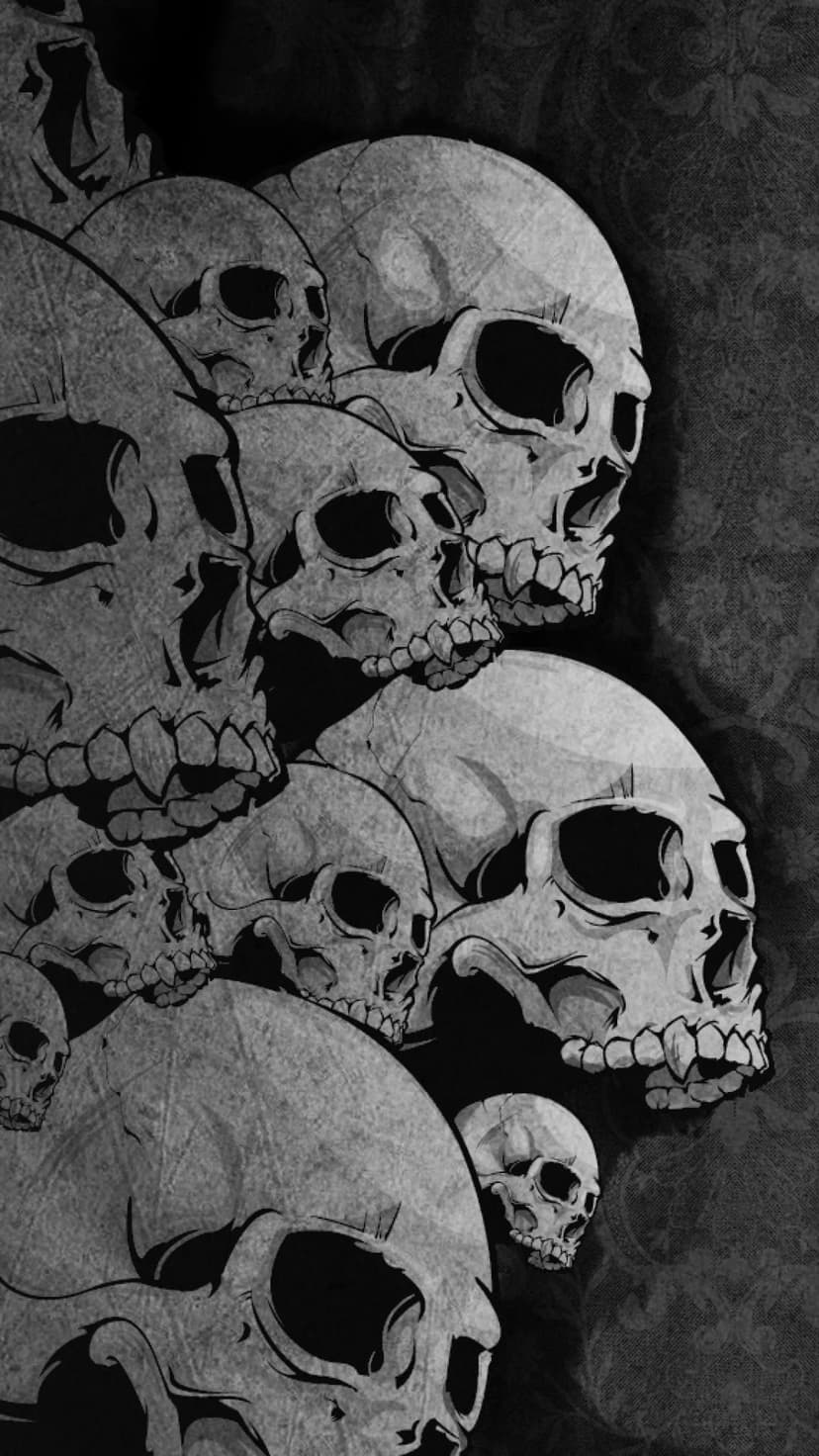 Human skulls of varying sizes stacked together in a high-contrast black and white vertical composition.