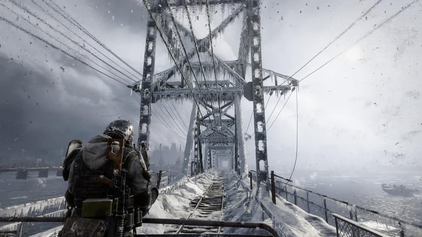 Survivor in winter gear looks down a frozen railway bridge with icicles under a gloomy, overcast sky.