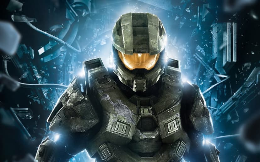 Master Chief in green armor with a glowing gold visor amidst blue sci-fi debris and cinematic lens flares.