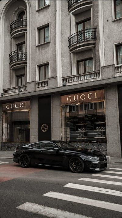Luxury Black Car Outside Gucci Store, High Fashion Vibe