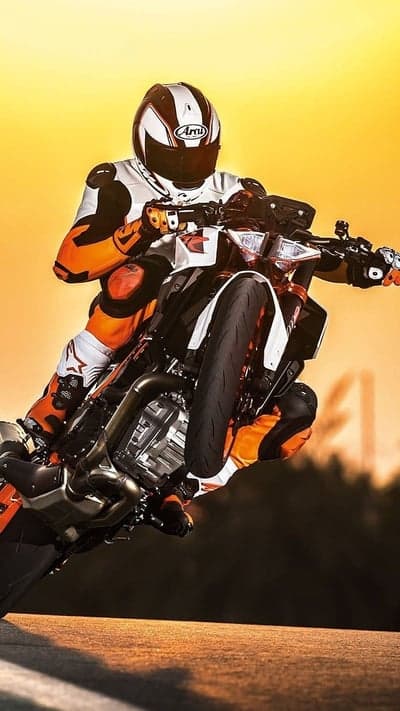 Orange Sunset Motorcycle Wheelie Stunt Phone Wallpaper