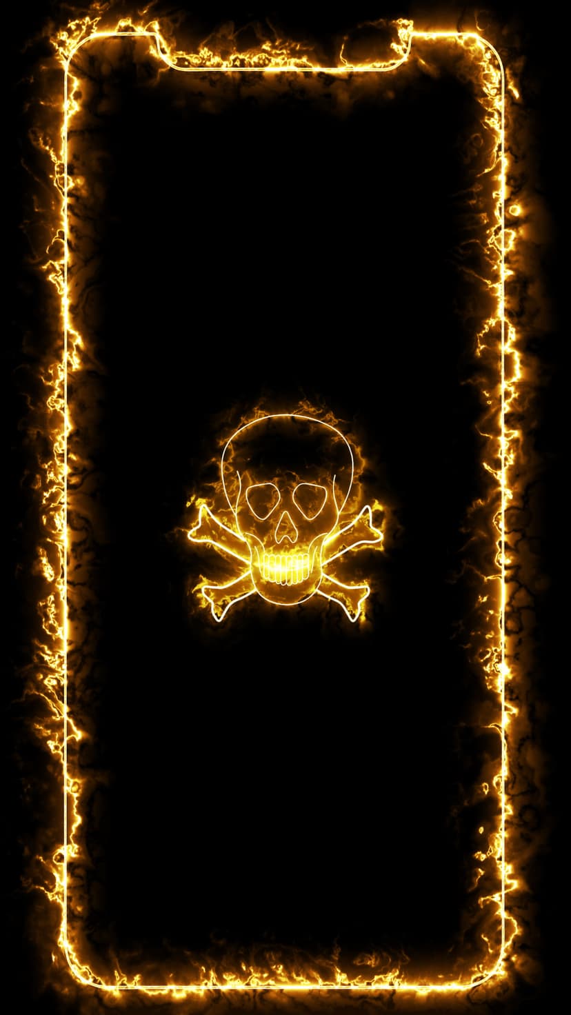Skull and crossbones with a luminous yellow fire outline centered on a black background with flaming borders.